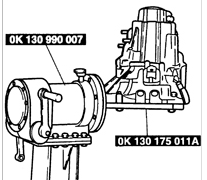 1. Установите коробку передач на стенде OK130 990 007 с переходником OK130