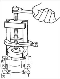 3. Установите съемник на компрессор так, как показано на рисунке. Установите