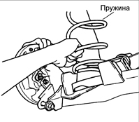 6. Отверните соединительную гайку и отсоедините задний тормозной шланг от