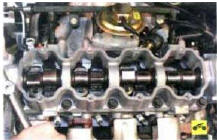 12. Выверните десять болтов крепления головки блока цилиндров к блоку в последовательности,