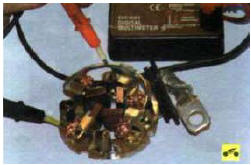 21. Осмотрите щеткодержатель. Проверьте высоту щеток в щеткодержателе. Если высота