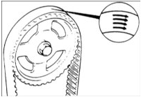 11. Снимите ролик механизма натяжения зубчатого ремня.