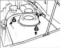 3. Отверните гайки верхнего крепления стойки.
